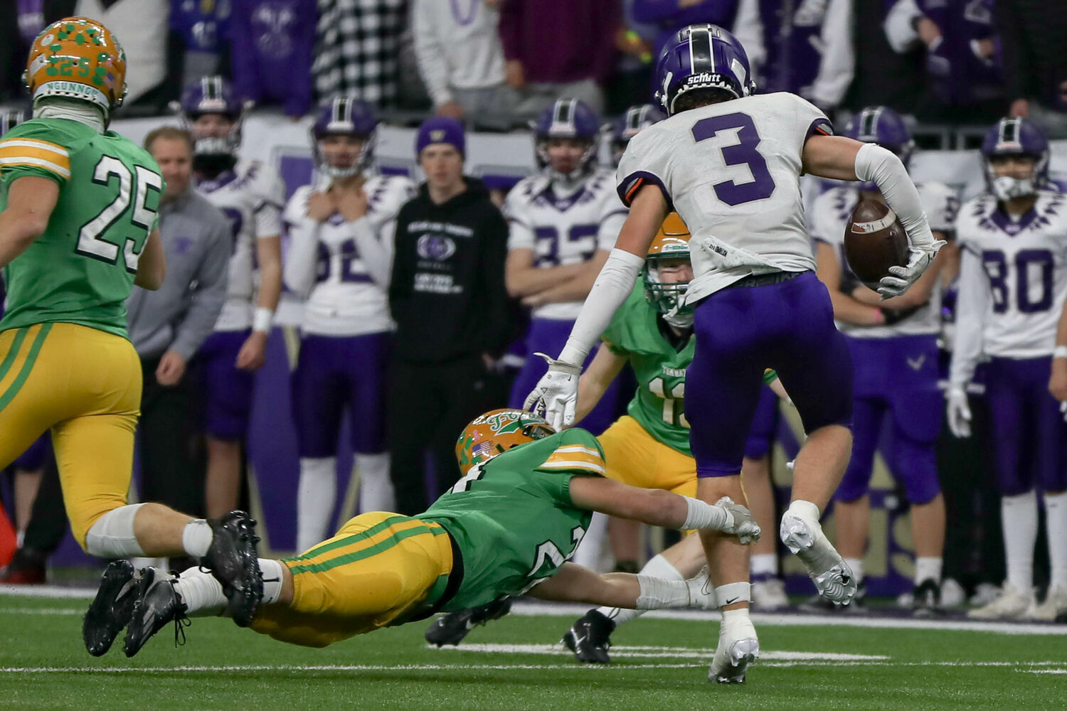 Tumwater's Tyler Criss dives for a tackle during a 60-30 loss to Anacortes Dec. 2. at Husky Stadium.